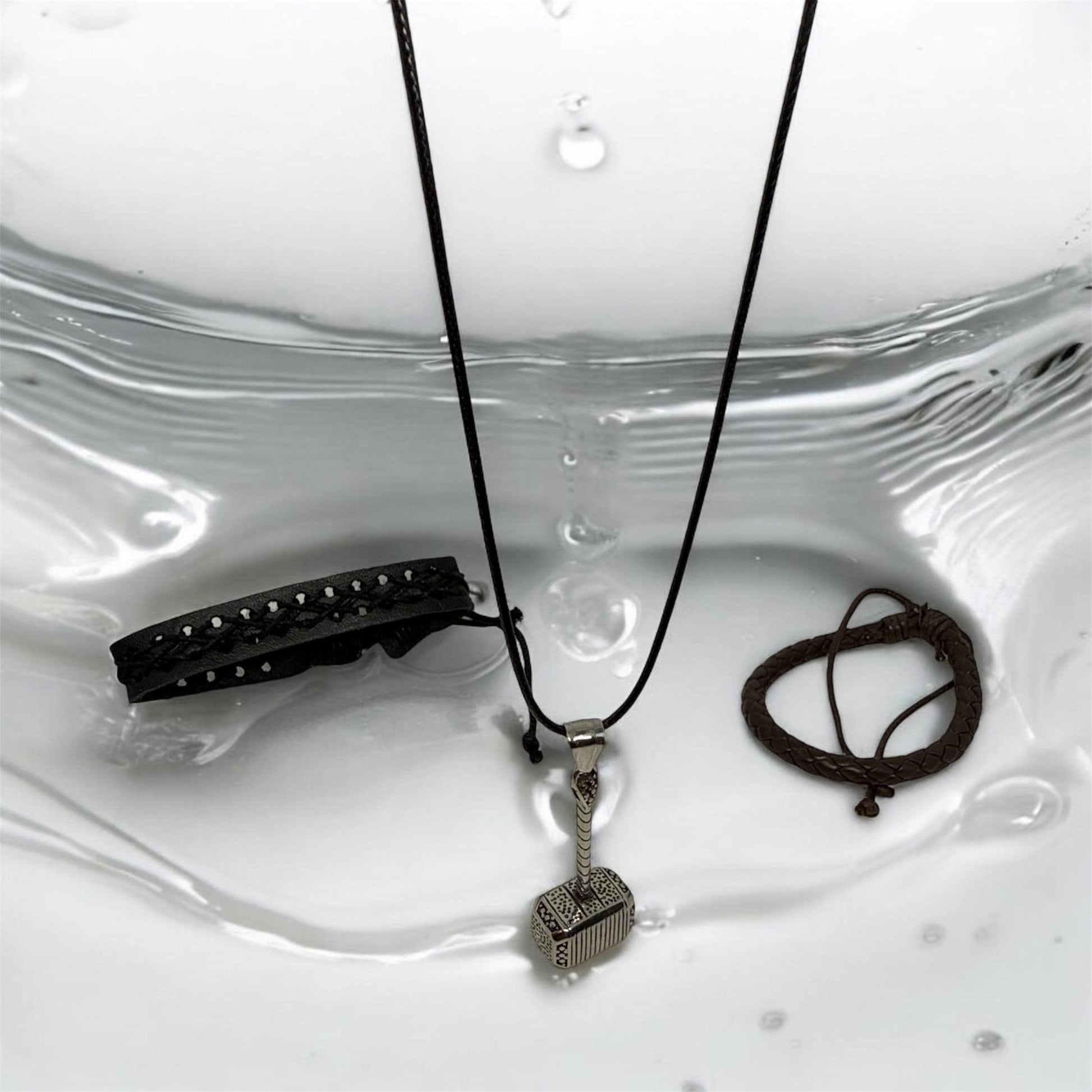 Handcrafted Nordic-Inspired Jewelry Set with Adjustable Bracelets and Hammer Pendant